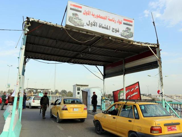 Iraqi security forces inspect a car at a checkpoint in Baghdad. US and Iraqi authorities were searching for three missing Americans said to have been kidnapped in southern Baghdad. (AFP) Iraqi security forces inspect a car at a checkpoint in Baghdad. US and Iraqi authorities were searching for three missing Americans said to have been kidnapped in southern Baghdad. (AFP)