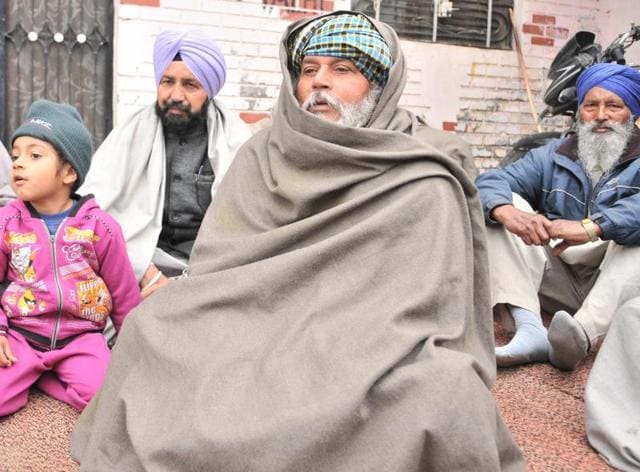 Balwinder Singh, father of Gurwinder Singh - one of the youth feared dead in the Panama boat tragedy.(Pradeep Pandit/HT Photo)