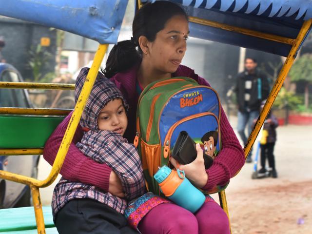 Citizens were seen wrapped in woolen clothes on a cold and foggy morning, at Mayur Vihar in New Delhi, India, on Monday, January 18, 2016. (Hindustan Times) Citizens were seen wrapped in woolen clothes on a cold and foggy morning, at Mayur Vihar in New Delhi, India, on Monday, January 18, 2016. (Hindustan Times)