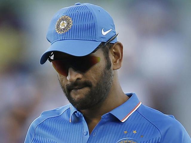 India's MS Dhoni walks back to his wicket keeping position during their one day international cricket match against Australia. (AP Photo) India's MS Dhoni walks back to his wicket keeping position during their one day international cricket match against Australia. (AP Photo)
