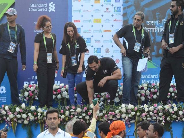 John Abraham meets fans during the Standard Chartered Mumbai Marathon 2016.  (IANS) 
