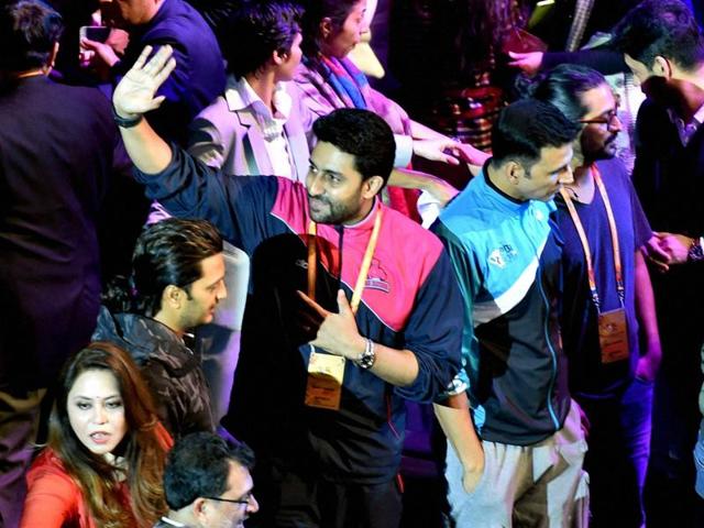 Abhishek Bachchan ,Akshay Kumar and Ritesh Deshmukh during the Premier Badminton League in New Delhi on Sunday.  (PTI) 