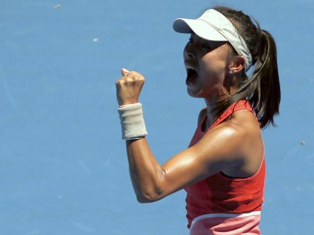 China's Wang Qiang celebrates winning her first round match against Sloane Stephens of the US. (Reuters Photo)