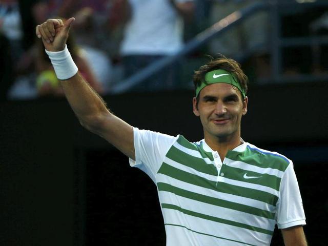 Switzerland's Roger Federer celebrates after winning his first-round match against Georgia's Nikoloz Basilashvili. (Reuters Photo)