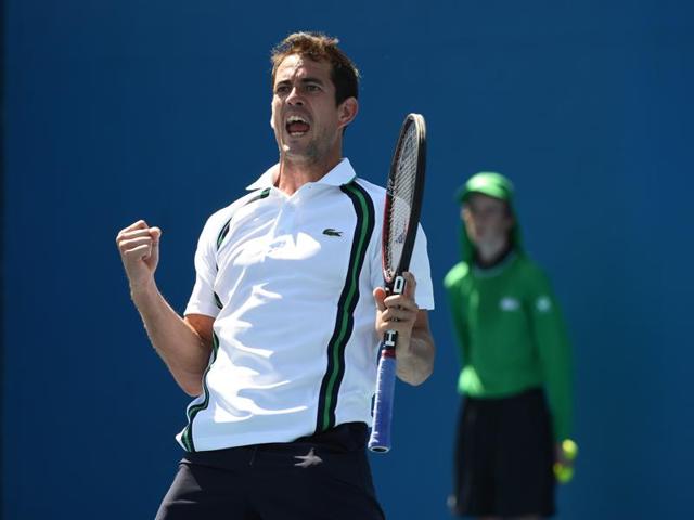 Spain's Guillermo Garcia-Lopez celebrates during his win over France's Paul-Henri Mathieu. (AFP Photo)