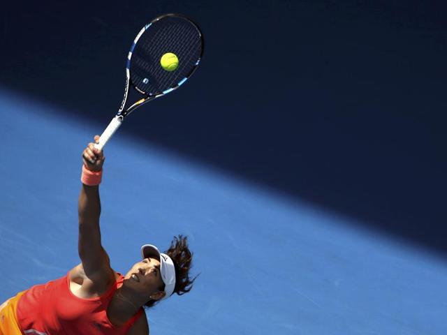 Spain's Garbine Muguruza serves during her first round match against Estonia's Anett Kontaveit. (Jason O'Brien/ REUTERS) 