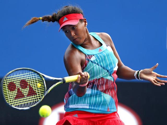 Japan's Naomi Osaka hits a forehand return to Donna Vekic of Croatia during their first round match. (Rafiq Maqbool/ AP Photo) 