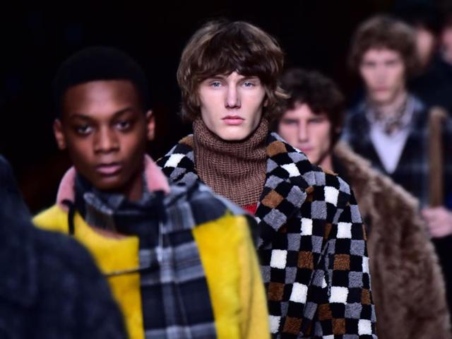Models present creations for fashion house Fendi. (AFP) Models present creations for fashion house Fendi. (AFP)