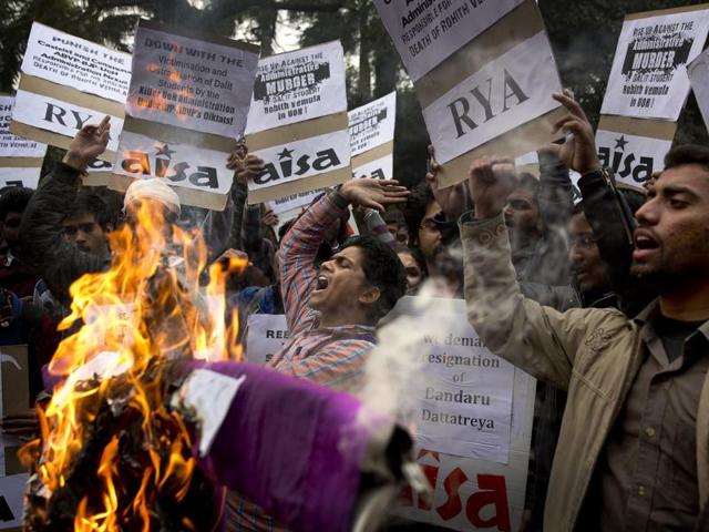 Students burn effigies of Hyderabad University's vice-chancellor and Union minister Bandaru Dattatreya . (AP Photo) 