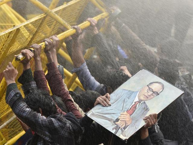Police use water cannons to disperse students during a protest against the HRD ministry in New Delhi on Monday over the suicide of a PhD scholar Rohith Vemula at Hyderabad Central University. (Vipin Kumar/HT) Police use water cannons to disperse students during a protest against the HRD ministry in New Delhi on Monday over the suicide of a PhD scholar Rohith Vemula at Hyderabad Central University. (Vipin Kumar/HT)