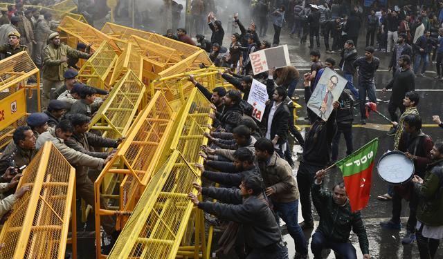 Police use water canon to disperse members of various student organisations during a protest in front of HRD ministry office at Shashtri Bhawan, demanding to sack the vice chancellor of Hyderabad Central University. (Vipin Kumar/Hindustan Times) Police use water canon to disperse members of various student organisations during a protest in front of HRD ministry office at Shashtri Bhawan, demanding to sack the vice chancellor of Hyderabad Central University. (Vipin Kumar/Hindustan Times)