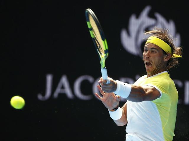 Nadal hits a shot during his first round match against Verdasco. (Thomas Peter/ REUTERS) 