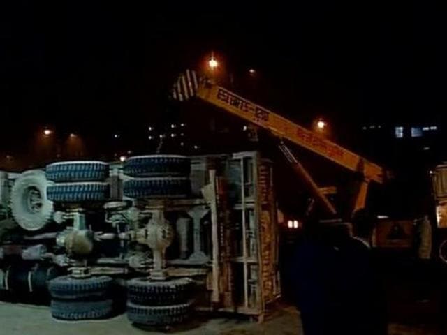 The incident occurred around midnight on Tuesday, while the sand-laden truck was taking a U-turn under the IIT Delhi flyover. (ANI) The incident occurred around midnight on Tuesday, while the sand-laden truck was taking a U-turn under the IIT Delhi flyover. (ANI)