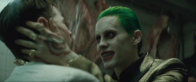 Joker can’t wait to show you his toys. (Warner Bros.)