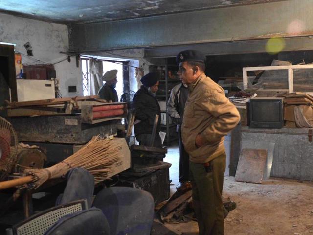 A police team at the storeroom of the Government College of Art at Sector 10, Chandigarh, where the theft took place. (HT FILE PHOTO) A police team at the storeroom of the Government College of Art at Sector 10, Chandigarh, where the theft took place. (HT FILE PHOTO)