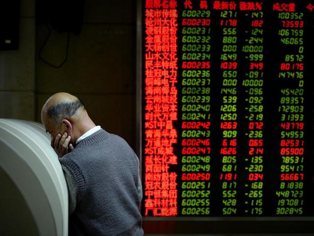 Asian markets resumed their downward spiral on January 20 with the previous day's China-fuelled rally effectively wiped out by ongoing worries about plunging oil prices and the state of the world economy. (AFP Photo) Asian markets resumed their downward spiral on January 20 with the previous day's China-fuelled rally effectively wiped out by ongoing worries about plunging oil prices and the state of the world economy. (AFP Photo)