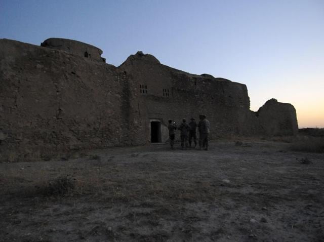 In this file photo, released by the US Army, visitors stand at the entrance to the ruins of St Elijah’s Monastery after completing a tour there, at Forward Operating Base Marez in Mosul, Iraq. The monastery has been reduced to a field of rubble, yet another victim of the Islamic State's relentless destruction. (US Army via AP Photo) In this file photo, released by the US Army, visitors stand at the entrance to the ruins of St Elijah’s Monastery after completing a tour there, at Forward Operating Base Marez in Mosul, Iraq. The monastery has been reduced to a field of rubble, yet another victim of the Islamic State's relentless destruction. (US Army via AP Photo)