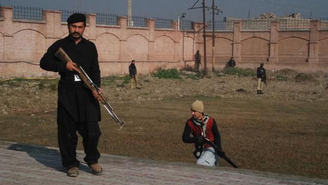 This photograph taken from a mobile phone shows Pakistani security personnel taking position outside the Bacha Khan university following an attack by gunmen in Charsadda. A breakaway faction of the Pakistan Taliban has claimed responsibility for the attack. (AFP Photo) This photograph taken from a mobile phone shows Pakistani security personnel taking position outside the Bacha Khan university following an attack by gunmen in Charsadda. A breakaway faction of the Pakistan Taliban has claimed responsibility for the attack. (AFP Photo)