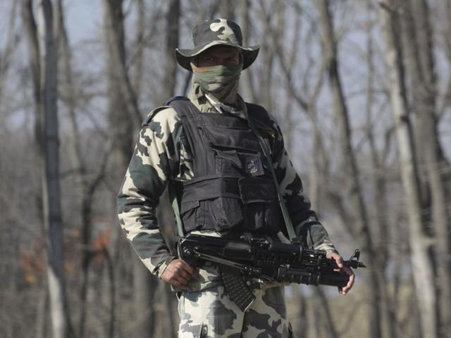 A paramilatary soldier stands guard near the encounter site of Pulwama in south Kashmir on Wednesday. (Waseem Andrabi/HT Photo) A paramilatary soldier stands guard near the encounter site of Pulwama in south Kashmir on Wednesday. (Waseem Andrabi/HT Photo)