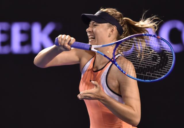 Maria Sharapova plays a forehand return during her women's singles match against Belarus's Aliaksandra Sasnovich. (AFP Photo) Maria Sharapova plays a forehand return during her women's singles match against Belarus's Aliaksandra Sasnovich. (AFP Photo)