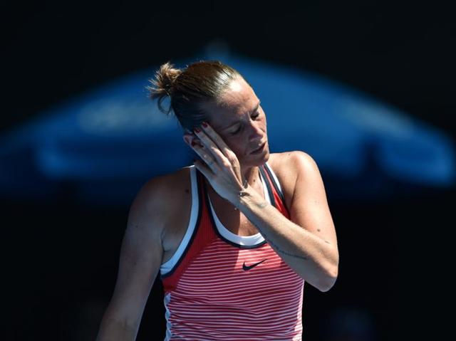 Italy's Roberta Vinci reacts after a point against Irina Falconi of the US during their women's singles match on day three of the 2016 Australian Open. (AFP Photo) 