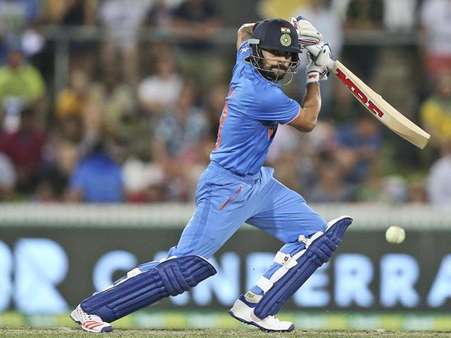 Indian batsman Virat Kohli plays a shot during his knock of 106. (AP Photo) 