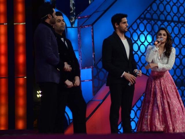 Karan Johar, Sidharth Malhotra, Alia Bhatt and Manish Paul at the annual Mumbai Police Melawa show in Mumbai on January 19, 2016.  (Viral Bhayani/HT) 
