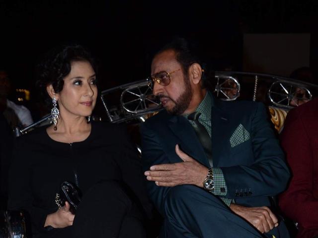 Gulshan Grover and Manisha Koirala chat up during the annual Mumbai Police Melawa show in Mumbai on January 19, 2016.  (Viral Bhayani/HT) 