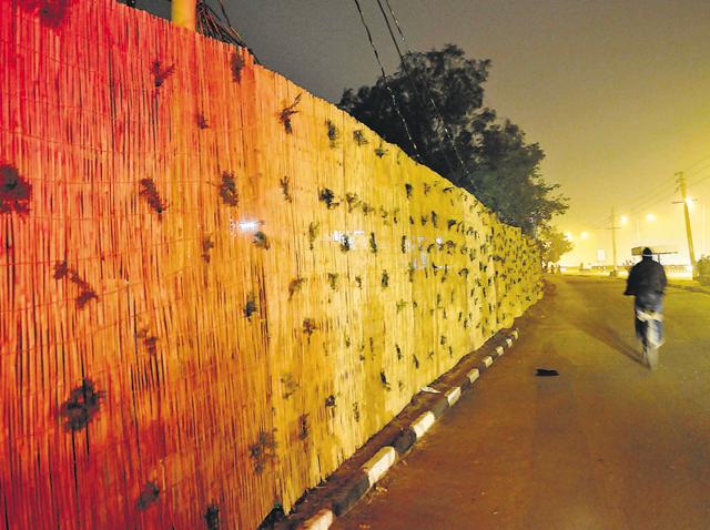 To keep the ugly side of the city out of sight of the high-profile guest, a virtual wall has been created from the technical airport towards Hallomajra (HT Photo) To keep the ugly side of the city out of sight of the high-profile guest, a virtual wall has been created from the technical airport towards Hallomajra (HT Photo)