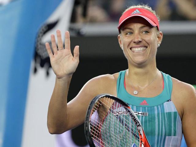 Angelique Kerber of Germany celebrates after defeating Alexandra Dulgheru of Romania in their second round match. (AP Photo)