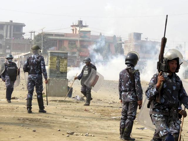 Nepal policemen use tear gas to disperse Madhesi protesters in Gaur, 160km south of Kathmandu.(AP Photo) Nepal policemen use tear gas to disperse Madhesi protesters in Gaur, 160km south of Kathmandu.(AP Photo)