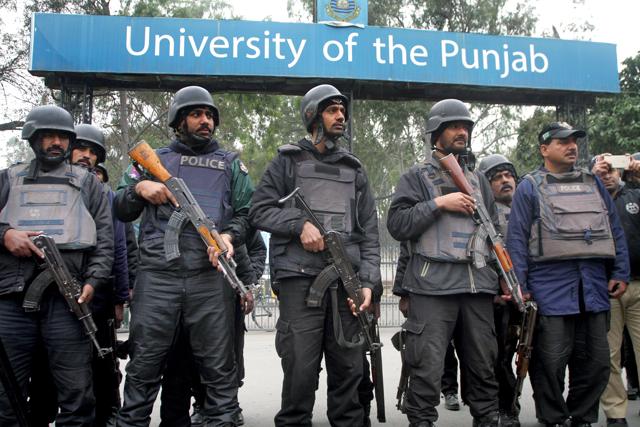 Pakistani police commandos stand guard outside a local university during a security drill in Lahore. (AP) Pakistani police commandos stand guard outside a local university during a security drill in Lahore. (AP)