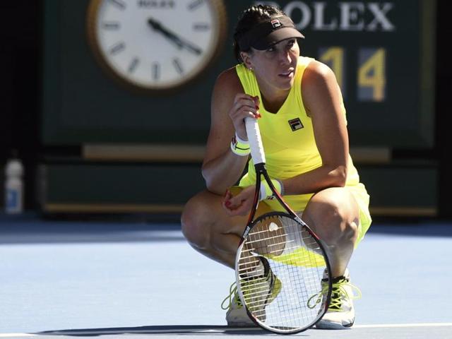 Serbia's Jelena Jankovic reacts after losing her second round match against Germany's Laura Siegemund. (Reuters Photo)