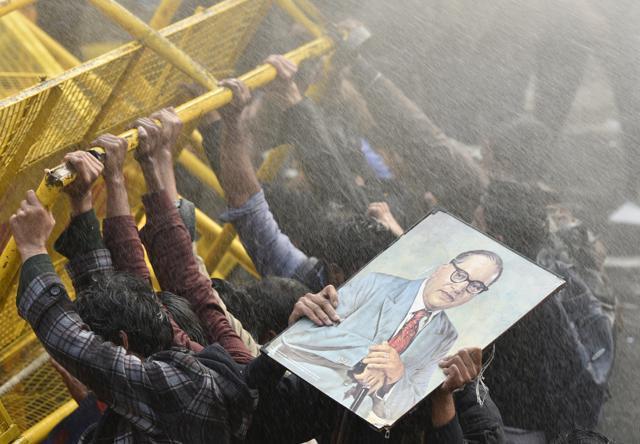 Police use water canon to disperse students protesting in Delhi against the death of Rohith Vemula . (Vipin Kumar / HT Photo) Police use water canon to disperse students protesting in Delhi against the death of Rohith Vemula . (Vipin Kumar / HT Photo)