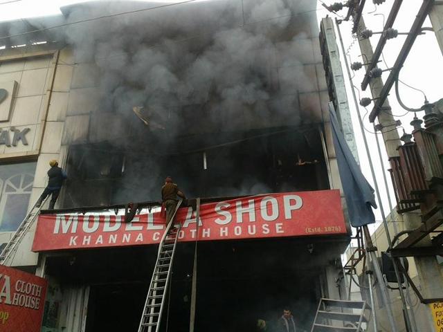 Fire outbreak at a shop in Model Town, Jalandhar. (HT Photo) Fire outbreak at a shop in Model Town, Jalandhar. (HT Photo)