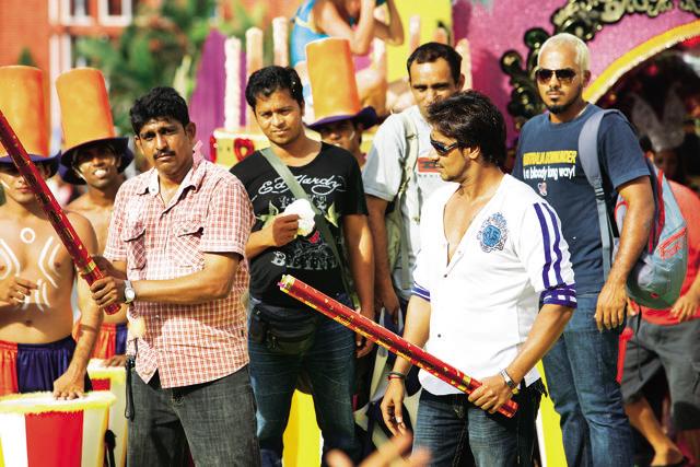 Agnelo D’souza (left) with Ajay Devgn.