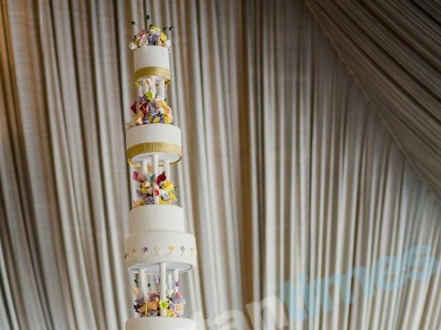 The wedding cake for the Christian ceremony is a work of art. (Stories by Joseph Radhik) The wedding cake for the Christian ceremony is a work of art. (Stories by Joseph Radhik)