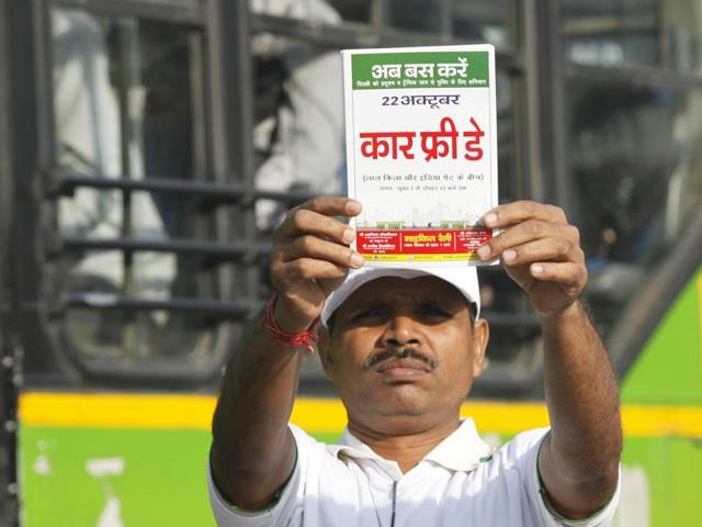 File photo of a civil defence volunteer holding a placard during a cycle rally on Car Free Day in New Delhi. (HT Photo/Raj K Raj) File photo of a civil defence volunteer holding a placard during a cycle rally on Car Free Day in New Delhi. (HT Photo/Raj K Raj)