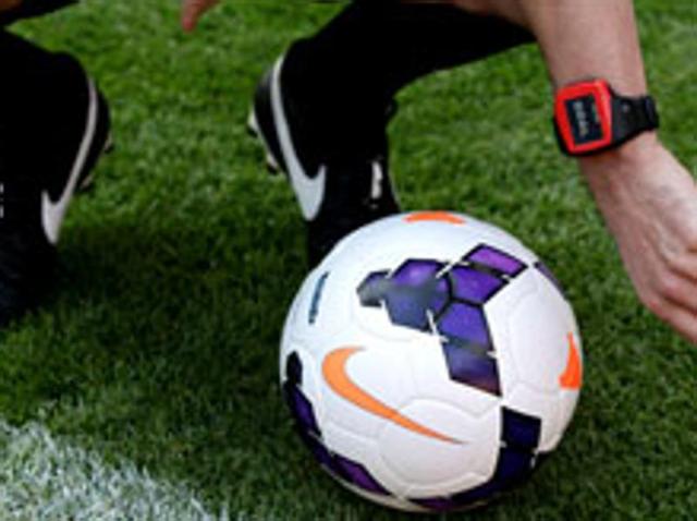 Referee Anthony Taylor demonstrates how a watch notifies referees in a football match when the ball crosses the goal line. (AP Photo) Referee Anthony Taylor demonstrates how a watch notifies referees in a football match when the ball crosses the goal line. (AP Photo)