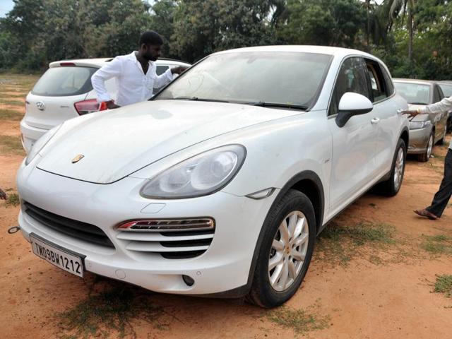 A Porche at Chennai yard. The marquee brands are selling cheap as these were “damaged” in the devastating floods in December last year. (V Srinivasulu / HT Photo)