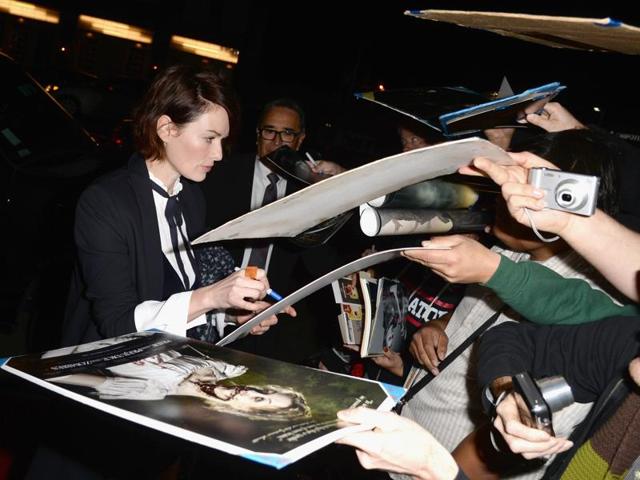 Actor Lena Headey attends the premiere of Screen Gems' Pride and Prejudice and Zombies and is  hounded for autographs. (AFP) 