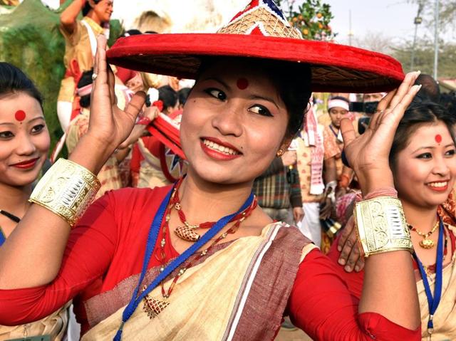 A participant from Assam poses for a picture in her traditional attire. (Ajay Aggarwal/ HT Photo)