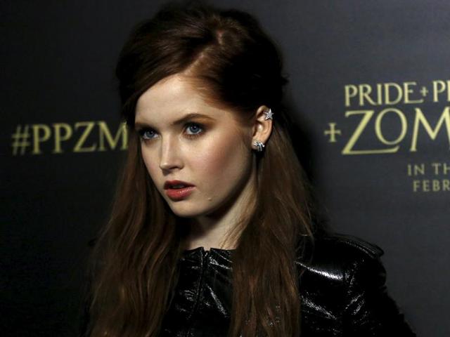 Cast member Ellie Bamber poses at the premiere of the genre mashup movie Pride and Prejudice and Zombies. (REUTERS) 