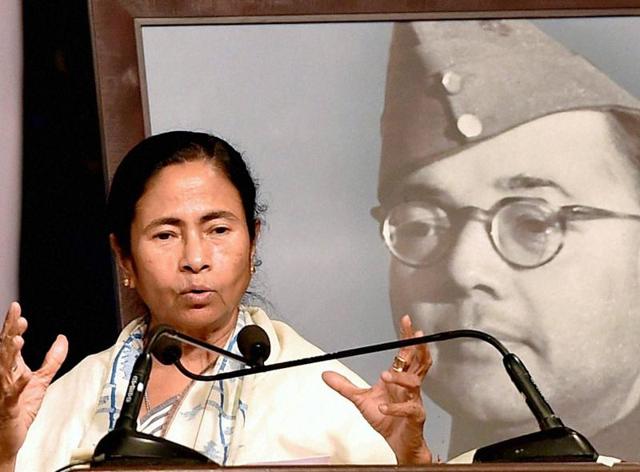 West Bengal chief minister Mamata Banerjee addresses a programme to mark the 75th anniversary of the "great escape" of Netaji Subhash Chandra Bose from house confinement in Kolkata(PTI)