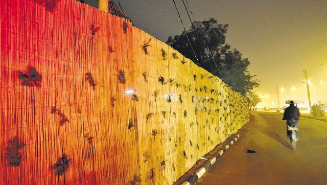 To keep the ugly side of the city out of sight of the high-profile guest, a virtual wall was created from the technical airport towards Hallomajra (HT File Photo) To keep the ugly side of the city out of sight of the high-profile guest, a virtual wall was created from the technical airport towards Hallomajra (HT File Photo)