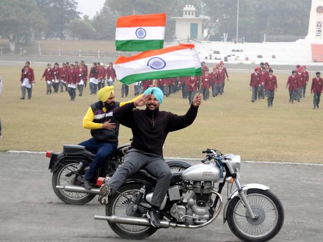 Young bikers perform stunts while rehearsing for the parade in Patiala on Saturday. (Bharat Batish/HT Photo) Young bikers perform stunts while rehearsing for the parade in Patiala on Saturday. (Bharat Batish/HT Photo)