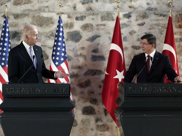 US vice-president Joe Biden talks as Turkish Prime Minister Ahmet Davutoglu looks on during a joint news conference following their meeting in Dolmabahce Palace in Istanbul. (AP Photo) US vice-president Joe Biden talks as Turkish Prime Minister Ahmet Davutoglu looks on during a joint news conference following their meeting in Dolmabahce Palace in Istanbul. (AP Photo)