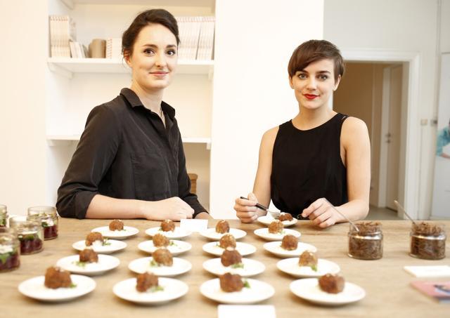 Katharina Unger (left) and Julia Kaisinger (right) are pictured with food from their "Hive", a machine to produce edible mealworms, in Vienna. The young Austrian entrepreneurs have developed a device to breed in the comfort of your own home the protein-rich grubs of the meal beetle, to then eat. (AFP) Katharina Unger (left) and Julia Kaisinger (right) are pictured with food from their "Hive", a machine to produce edible mealworms, in Vienna. The young Austrian entrepreneurs have developed a device to breed in the comfort of your own home the protein-rich grubs of the meal beetle, to then eat. (AFP)