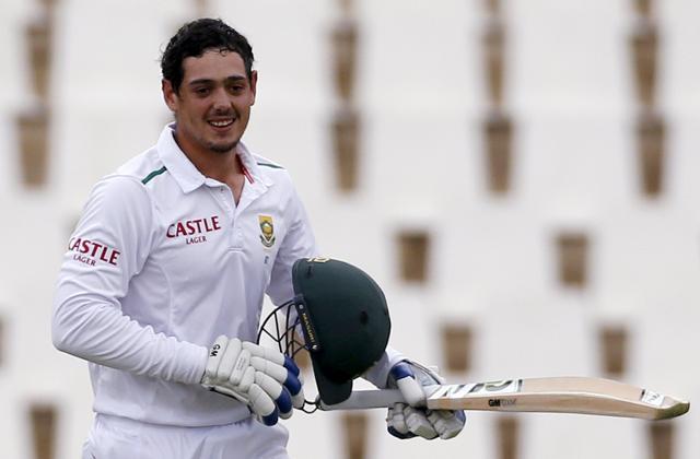 South Africa's Quinton de Kock celebrates his century during the fourth cricket test match against England . (Reuters Photo) South Africa's Quinton de Kock celebrates his century during the fourth cricket test match against England . (Reuters Photo)