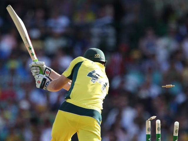 James Faulkner of Australia is bowled out from the Indian bowling. (AFP Photo) James Faulkner of Australia is bowled out from the Indian bowling. (AFP Photo)
